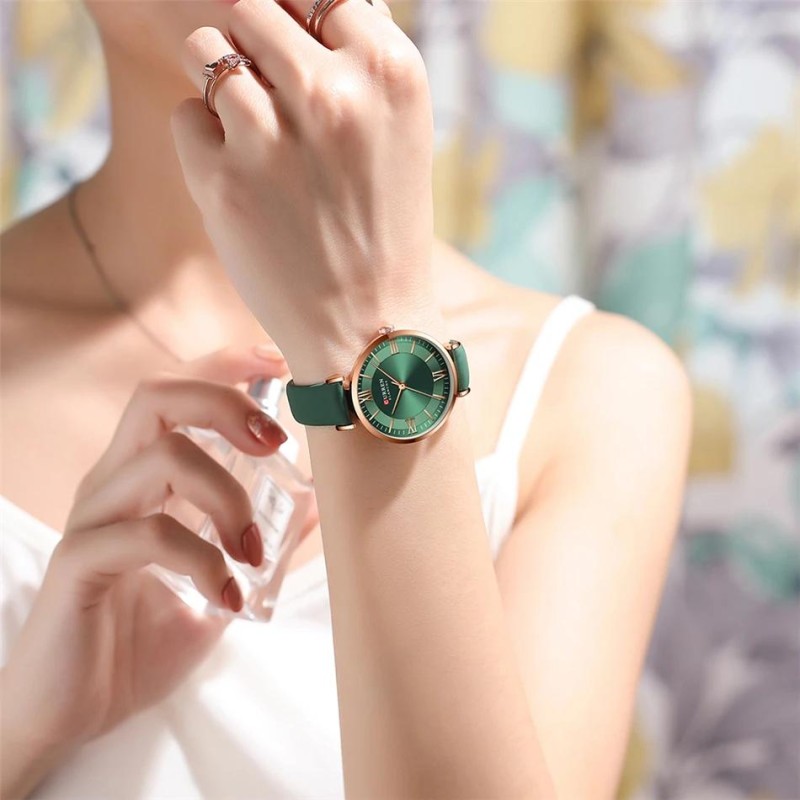 Жіночий годинник Curren 9079 Rose Gold-Dark Green з мінеральним склом та зеленим ремінцем