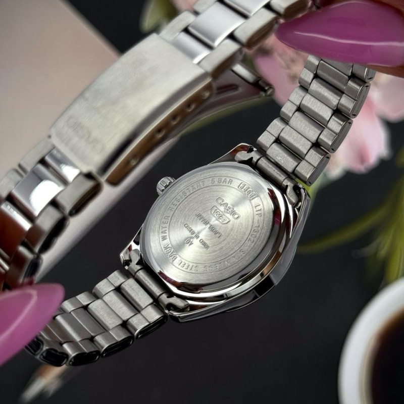 Жіночий годинник Casio LTP-1302DD-4A1 — Класична модель з рожевим циферблатом та мінеральним склом