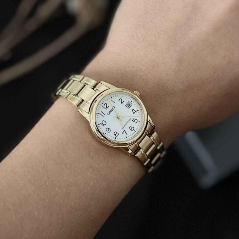 Жіночий годинник Casio LTP-V002G-7B2 з золотистим покриттям та відображенням дати