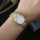 Жіночий годинник Casio LTP-V002G-7B2 з золотистим покриттям та відображенням дати