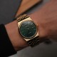 Чоловічий годинник Casio MTP-B146G-3A з зеленим циферблатом та золотистим браслетом
