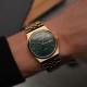 Чоловічий годинник Casio MTP-B146G-3A з зеленим циферблатом та золотистим браслетом