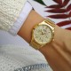 Жіночий годинник Casio LTP-V300G-9A золотистого кольору з багатофункціональним циферблатом